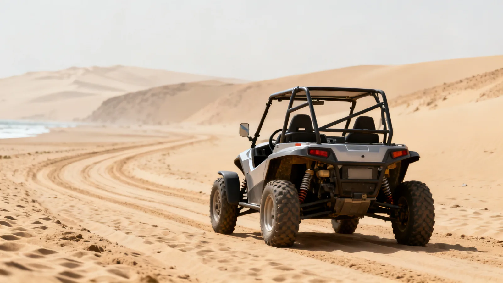 An unbranded buggy parked on a sandy track, photographic illustration